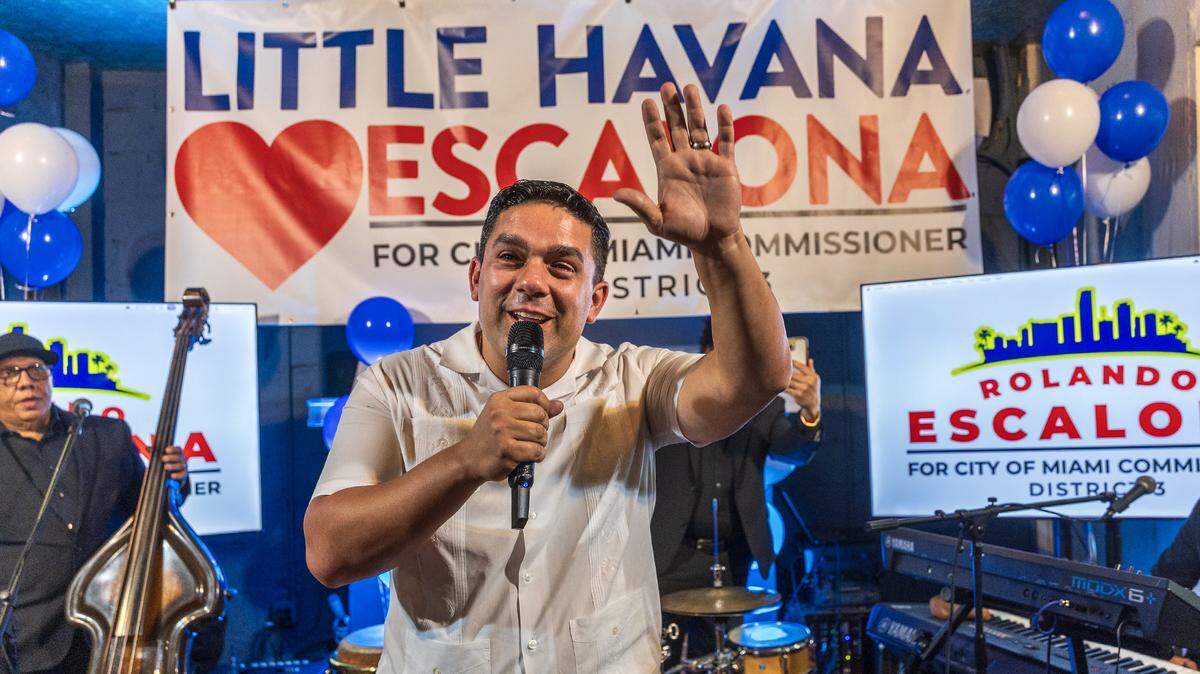 Rolando Escalona, candidate for the Miami District 3, reacts after defeating Frank Carollo during the runoff election for district 3, to replace Joe Carollo, on Dec. 09, 2025.