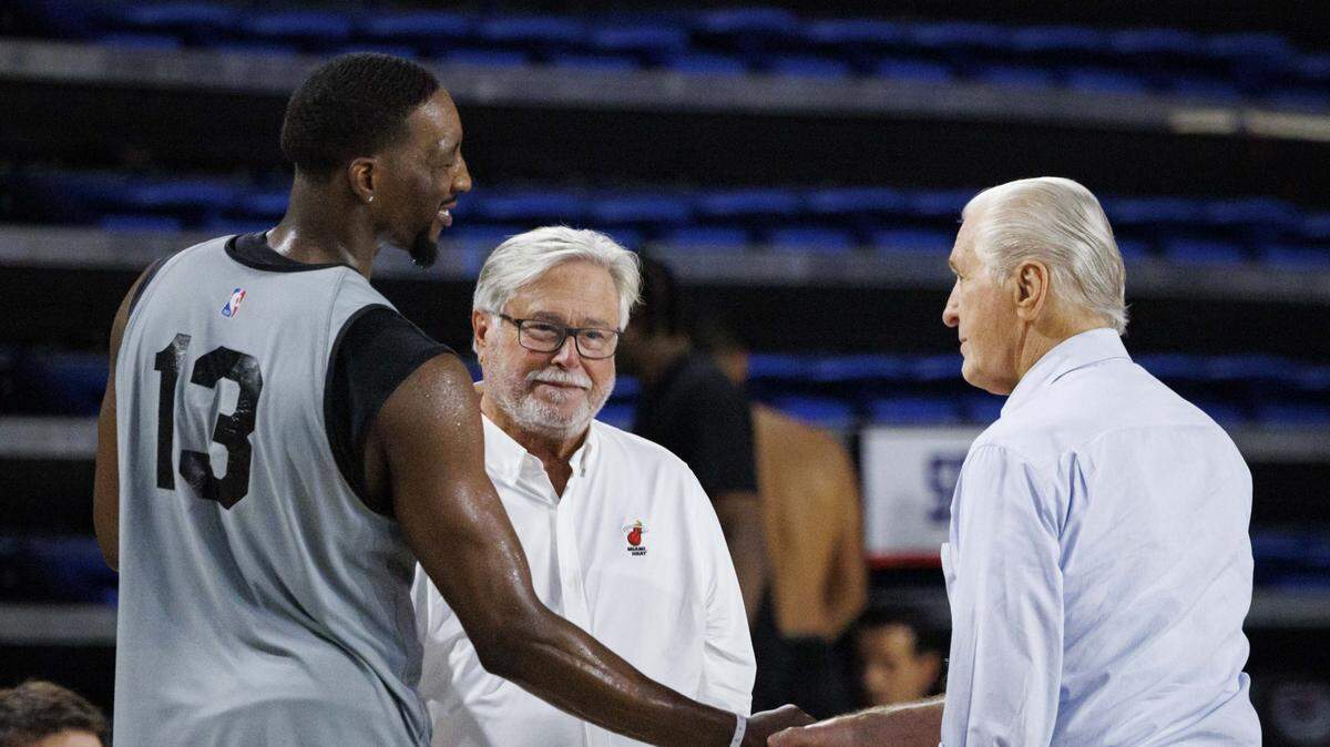 Bam Adebayo (13) shakes hands with Pat Riley, president of the Miami Heat, right, during the second day of Heat Training Camp on Oct. 1, 2025, at Florida Atlantic University in Boca Raton.