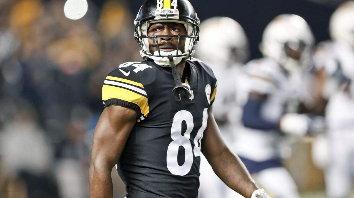 In this Dec. 2, 2018, file photo, Pittsburgh Steelers wide receiver Antonio Brown (84) plays against the Los Angeles Chargers in an NFL football game, in Pittsburgh. In a lawsuit filed Tuesday in federal court in Miami, his former trainer accuses him of raping and sexual assaulting her in three separate incidents. His attorney denied the allegations.