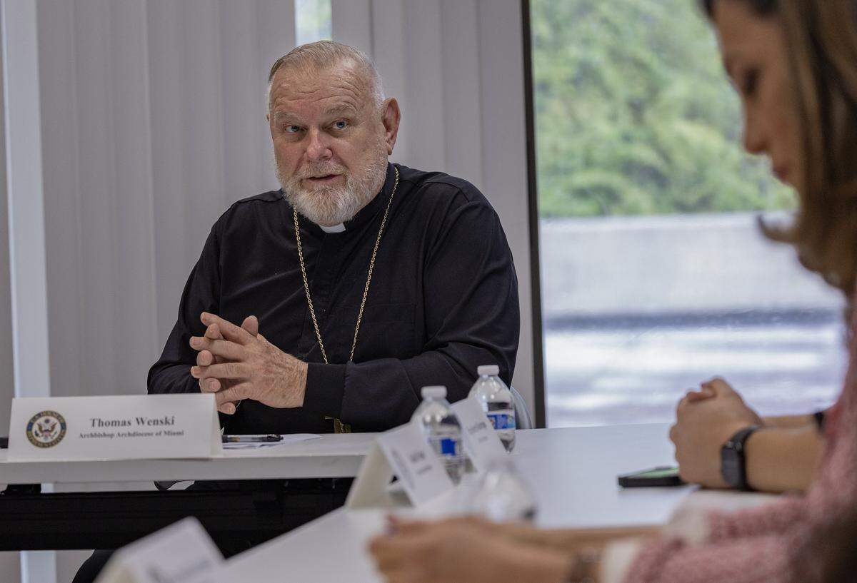 Archbishop Thomas Wenski speaks during a roundtable to discuss the “Dignity Act” bill by Congresswoman María Elvira Salazar, at the Westchester Regional Library, with a group of community leaders, on Tuesday September 23, 2025.