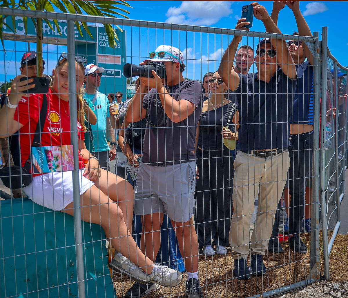 Fans watch as drivers participate in a practice session on the first day of the Formula One Miami Grand Prix at the Miami International Autodrome on Friday, May 2, 2025, in Miami Gardens, Fla.