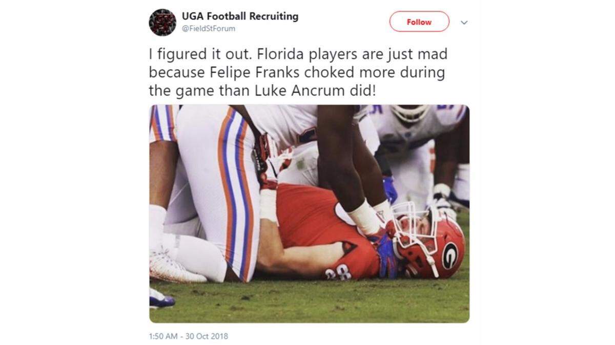 Florida’s Luke Ancrum posted a photo to Instagram, which has been deleted, depicting him choking Georgia’s Jackson Harris during Saturday’s game in Jacksonville, Florida.