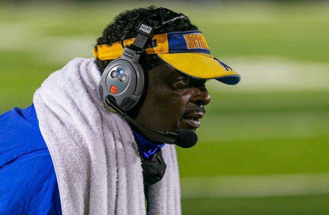 Ex-Northwestern Bulls head coach Max Edwards watches his team as they play against the Miami Central Rockets on Friday, October 1, 2021 at Nathaniel Traz Powell Stadium in Miami, Florida. Edwards now coaches at Miami Jackson High.