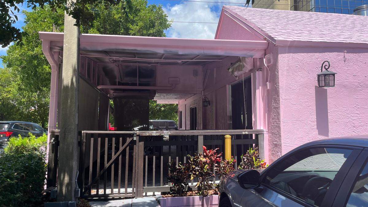 The pink exterior of Rincón Argentino restaurant in Coral Gables, which is now permanently closed.
