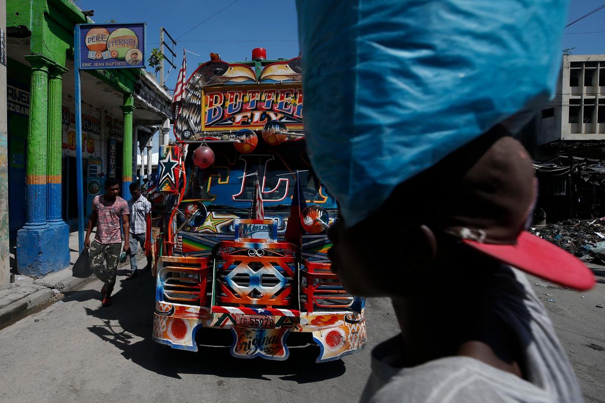 People in Port-au-Prince go about their day during a break in anti-government protests, which disrupted daily life in October 2019. Haitians are now frustrated with reports of a kidnapping wave as police “recognize the phenomenon.”