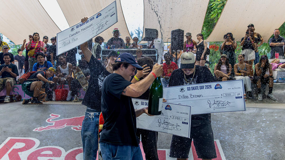 Alex Sorgente, in the foreground, celebrates with winners Camden Mashore, Sebastian Bradrach and Dillon Brown, from left to right, as he sprays champagne during the awards ceremony for the Concrete Heats at SkateBird Miami in Miami, Fla., on Sunday, June 21, 2026.