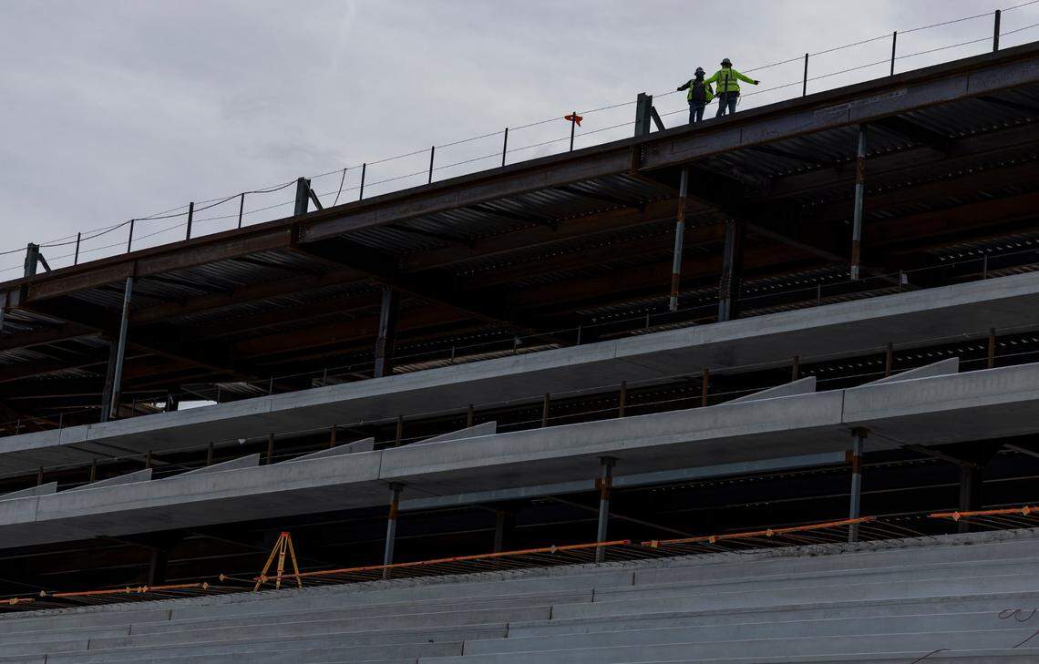 Crew members talk as construction progresses at Miami Freedom Park on Tuesday, June 24, 2025, in Miami, Fla.