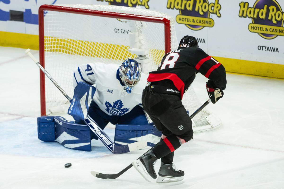 May 1, 2025; Ottawa, Ontario, CAN; Toronto Maple Leafs goalie Anthony Stolarz (41) makes a save on a shot from Ottawa Senators center Tim Stutzle (18) in game six of the first round of the 2025 Stanley Cup Playoffs at Canadian Tire Centre. Mandatory Credit: Marc DesRosiers-Imagn Images