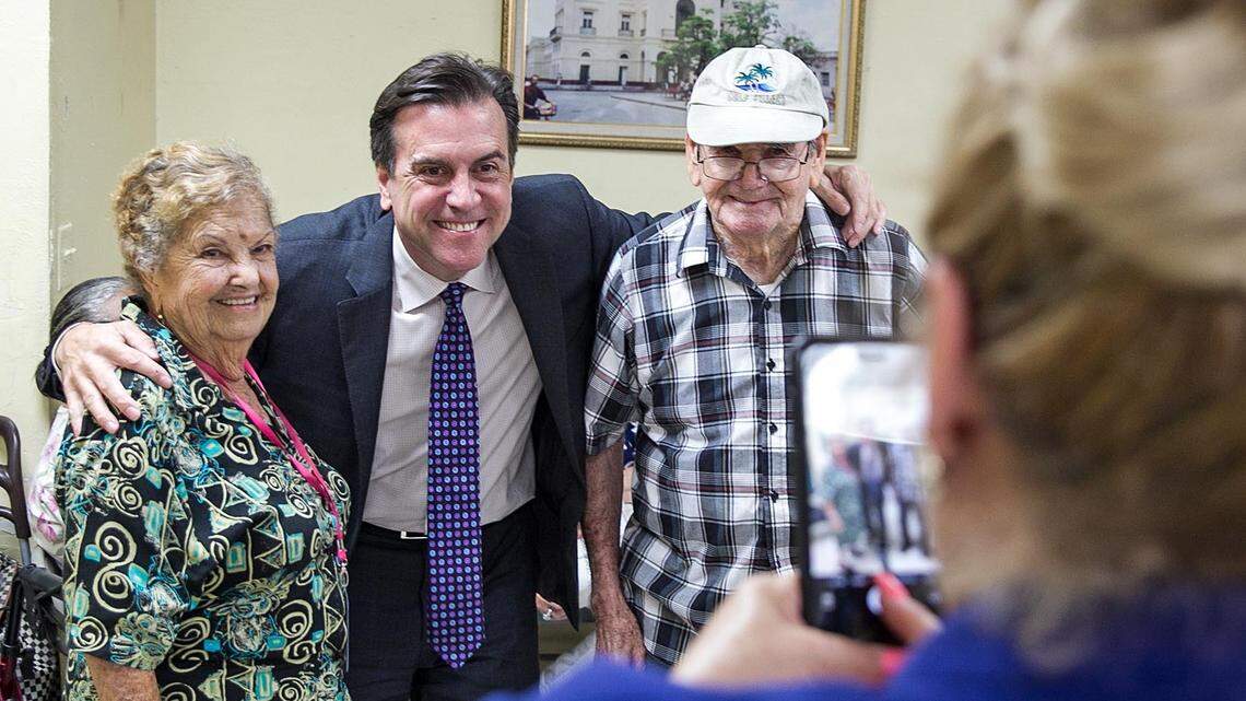 Miami-Dade Commission candidate Alex Diaz de la Portilla visits with senior citizens from the Little Havana Activities and Nutrition Center as he takes pictures with them as he campaigns for their vote on Friday, May 11, 2018.