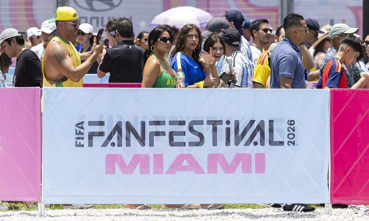 People arrive to the FIFA Fan Festival Miami at Bayfront Park on Saturday, June 13, 2026, in downtown Miami, Fla.