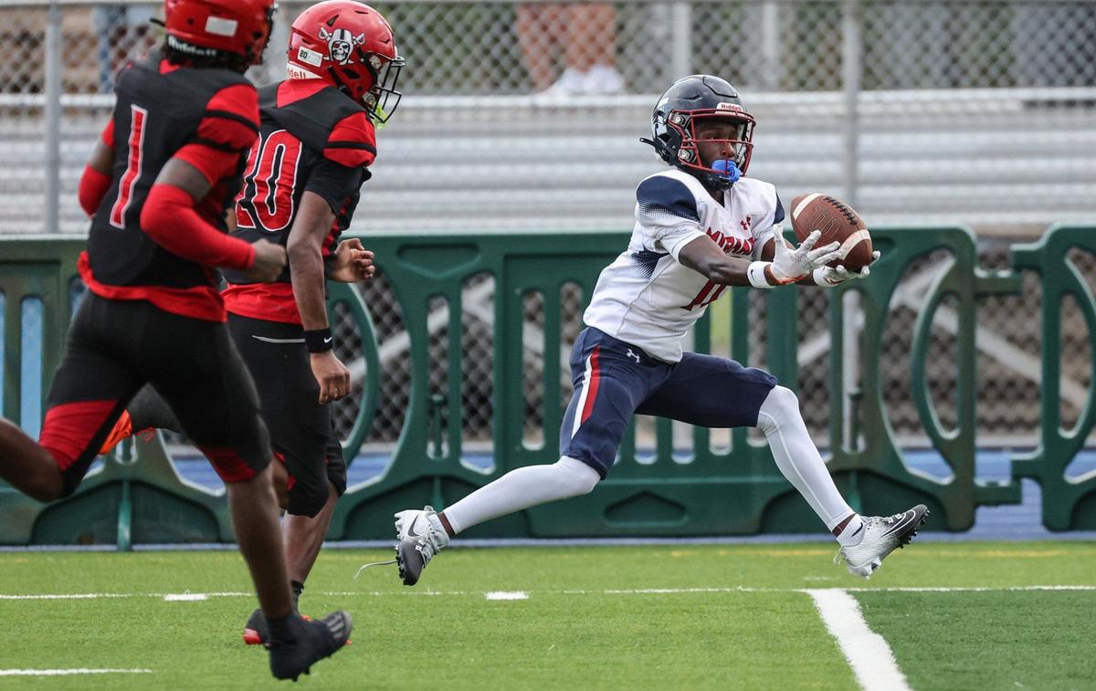 Miramar High’s Tristan Hill (11) on a pass reception for first down against Edison High School in the second quarter at Traz Powell Stadium in Miami, Florida on Friday, August 16, 2024.