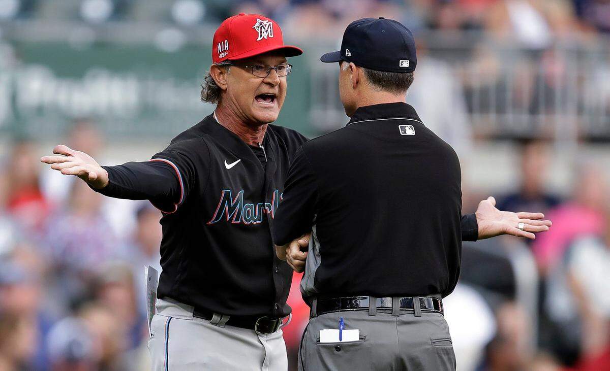Miami Marlins manager Don Mattingly reacts after being ejected in the first inning of the team’s baseball game against the Atlanta Braves on Friday, July 2, 2021, in Atlanta. (AP Photo/Ben Margot)