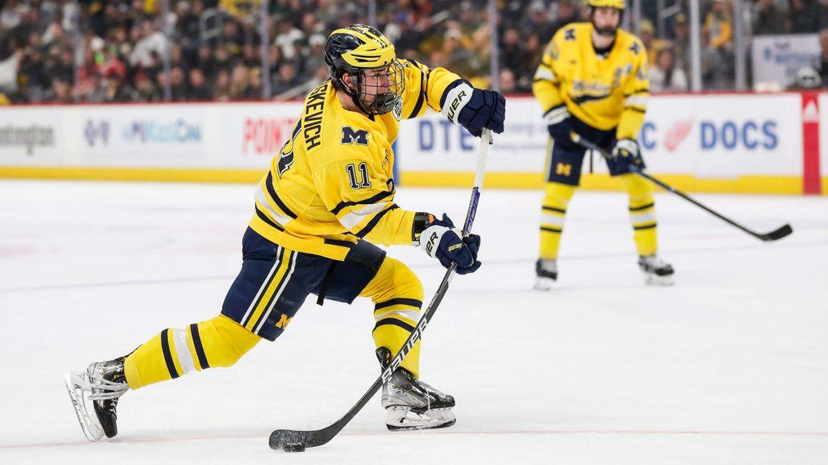 Michigan forward Mackie Samoskevich shoots the puck against Michigan State during the first period on Saturday, Feb. 11, 2023, at Little Caesars Arena.