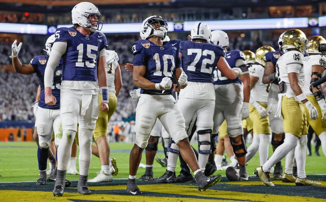 Penn State Nittany Lions running back Nicholas Singleton (10) reacts after scoring in the first half against the Notre Dame Fighting Irish during their NCAA Playoff Semifinal Capital One Orange Bowl football game at Hard Rock Stadium in Miami Gardens, Florida on Thursday, January 9, 2025.