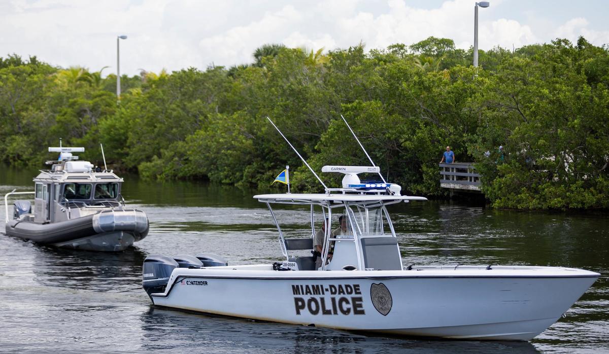 Fly High, Bird flags hang on Miami-Dade Police patrol boats seen at the Black Point Park and Marina on Friday, Aug. 30, 2024, in Homestead, Fla. The flags were given to the officers by the Melissa and Andres Fernandez, who started the Lucy Fernandez Foundation after their daughter was killed in a boat crash two years ago. They hope to raise awareness about boat safety with the flags.
