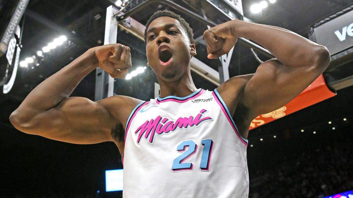 Miami Heat center Hassan Whiteside (21) flexes after a dunk in the first quarter in a game against the Orlando Magic at AmericanAirlines Arena on February 5.