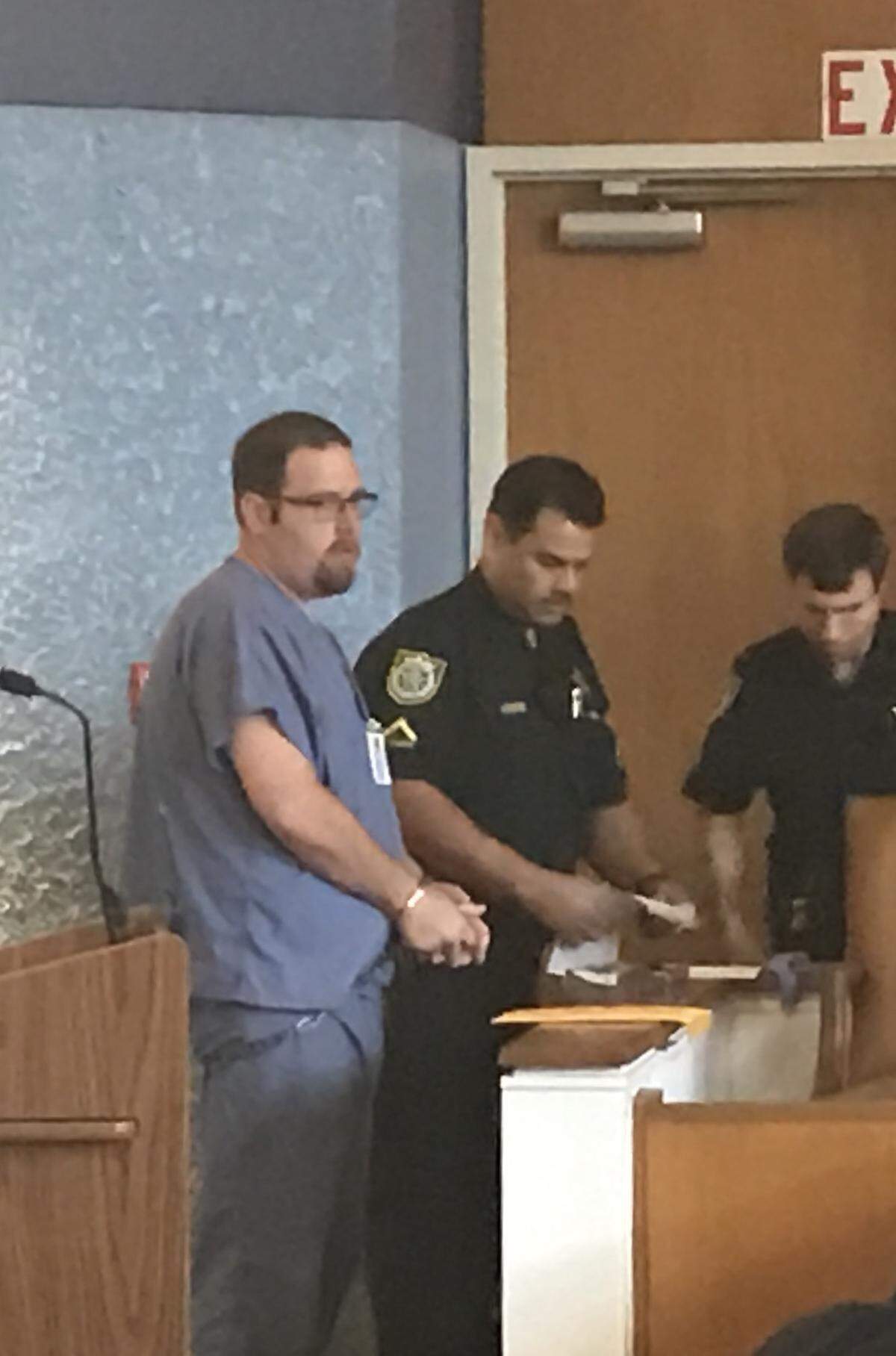 Monroe County Sheriff’s Office court deputies take Derek David’s fingerprints Wednesday, June 6, 2018, at the Plantation Key courthouse after he was sentenced to 18 years in prison on three counts of attempted manslaughter. He opened fire into a busy Key West crowd, shooting and wounding three Key West tourists in March 2016.