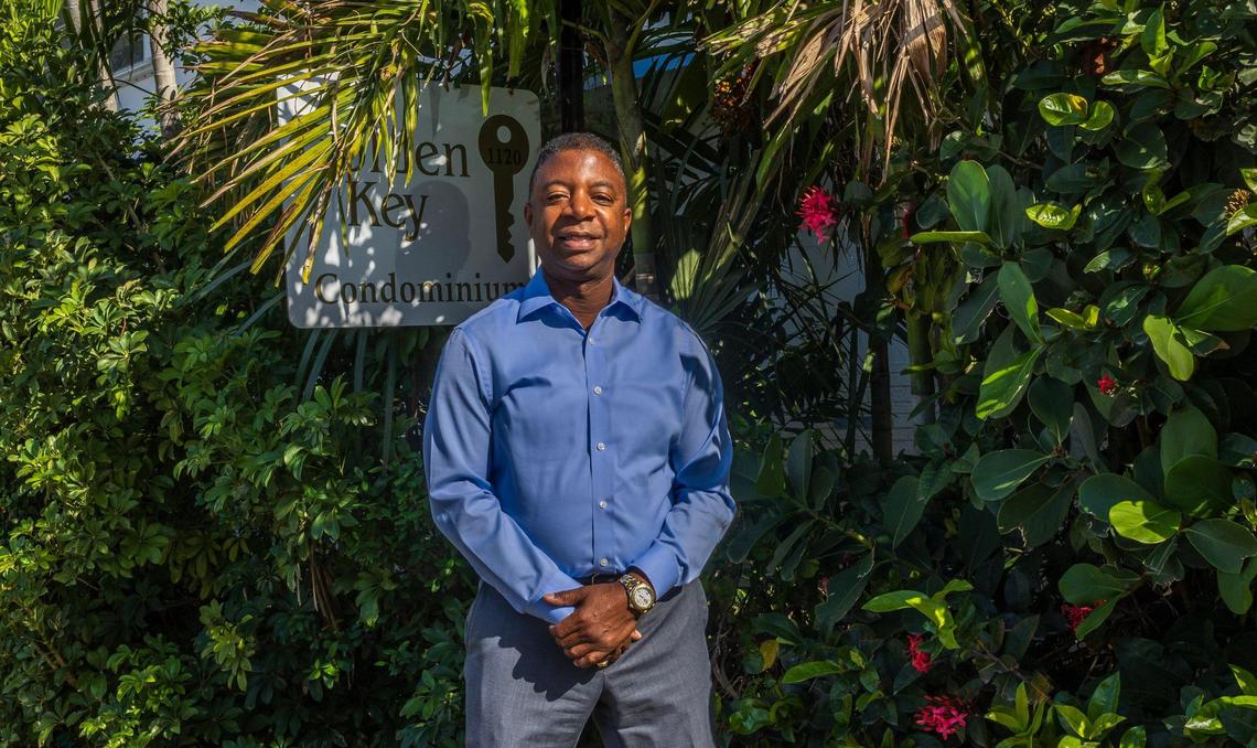 Board president Andre Williams stands at the entrance to the Golden Key Condominiums in Bay Harbor Islands. Managers of the modest 1960s condo have maintained affordability for owners while extensively refurbishing the building and successfully navigating recertification and stringent new post-Surfside state regulations.