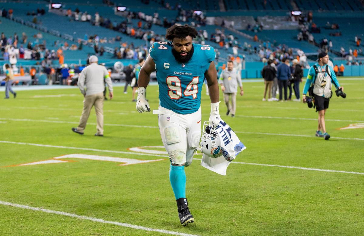Miami Dolphins defensive tackle Christian Wilkins (94) leaves the field after losing his NFL game against the Tennessee Titans at Hard Rock Stadium on Monday, Dec. 11, 2023, in Miami Gardens, Fla.
