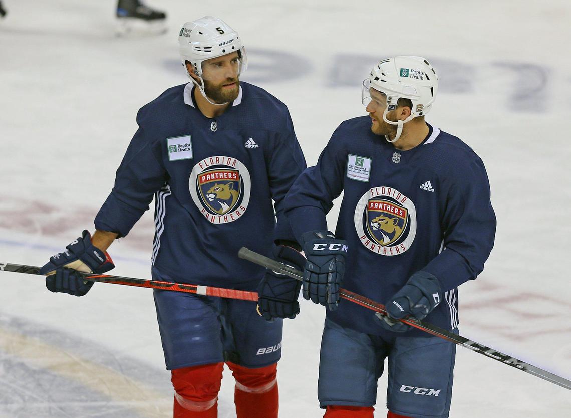 Florida Panthers Aaron Ekblad (5) and Jonathan Huberdeau (11) at practice at the BB&T Center in Sunrise, Florida, Tuesday, February 2, 2021.