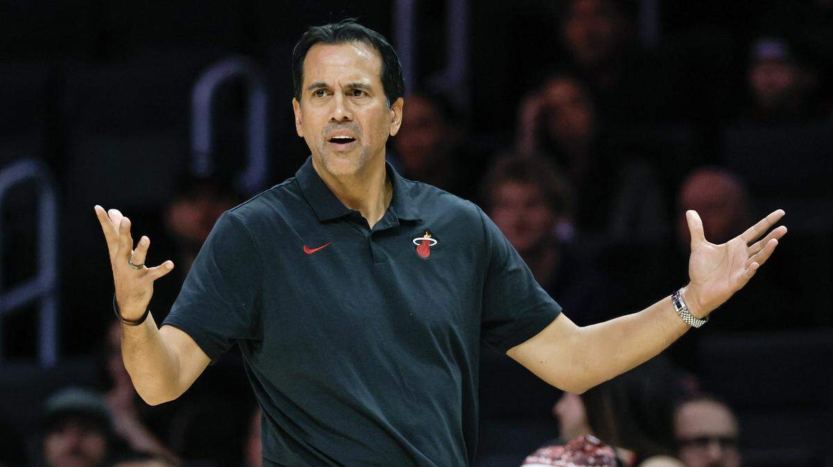 Miami Heat head coach Erik Spoelstra reacts on the court in the first half of their NBA basketball game against the Toronto Raptors at Kaseya Center in Miami on December 23, 2025.