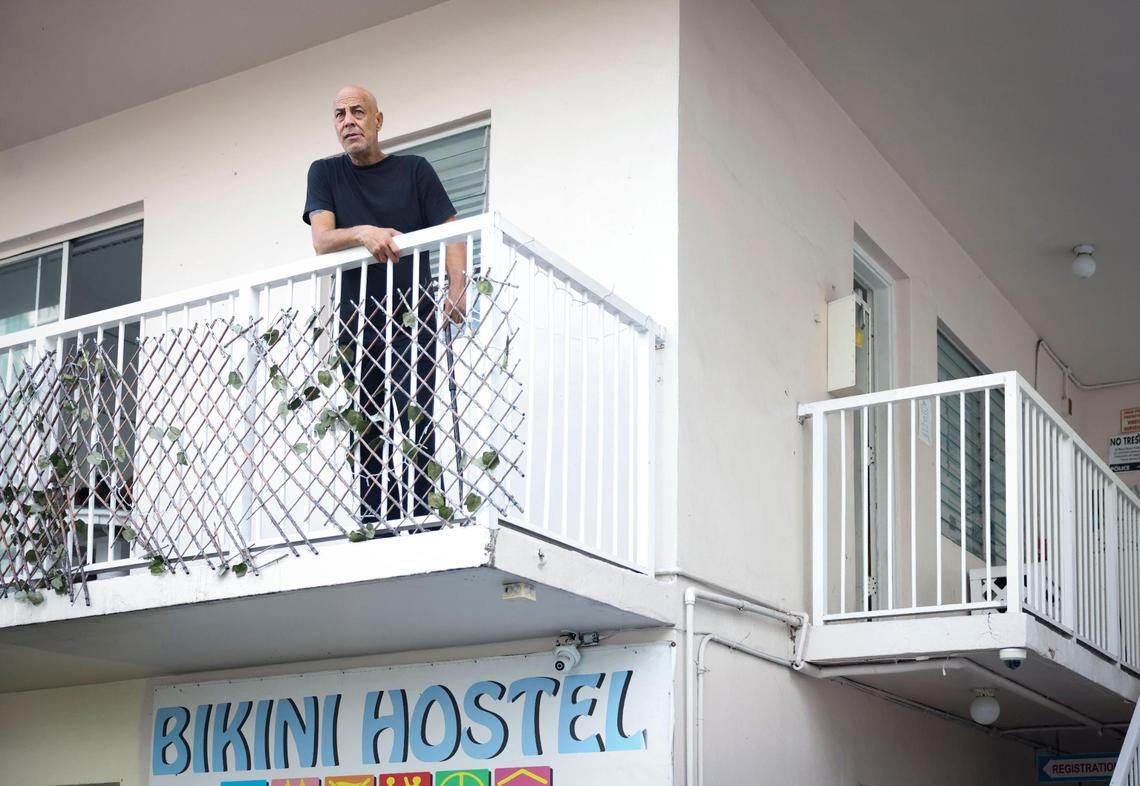 Lorenzo Galdeano listens from a balcony at the Bikini Hostel during a press conference on Wednesday, March 5, 2025, in Miami Beach, Florida.