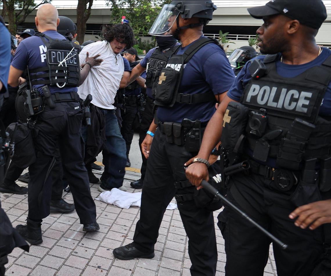 Police arrested several protesters at Bayside Marketplace after statues of Columbus and Ponce de Leon were defaced on Wednesday, June 10, 2020.
