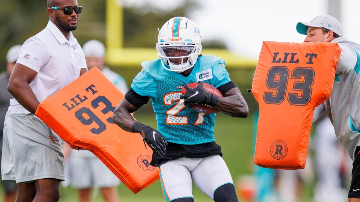Miami Dolphins cornerback Keion Crossen (27) runs with the football during NFL football training camp at Baptist Health Training Complex in Hard Rock Stadium on Monday, September 5, 2022 in Miami Gardens, Florida.
