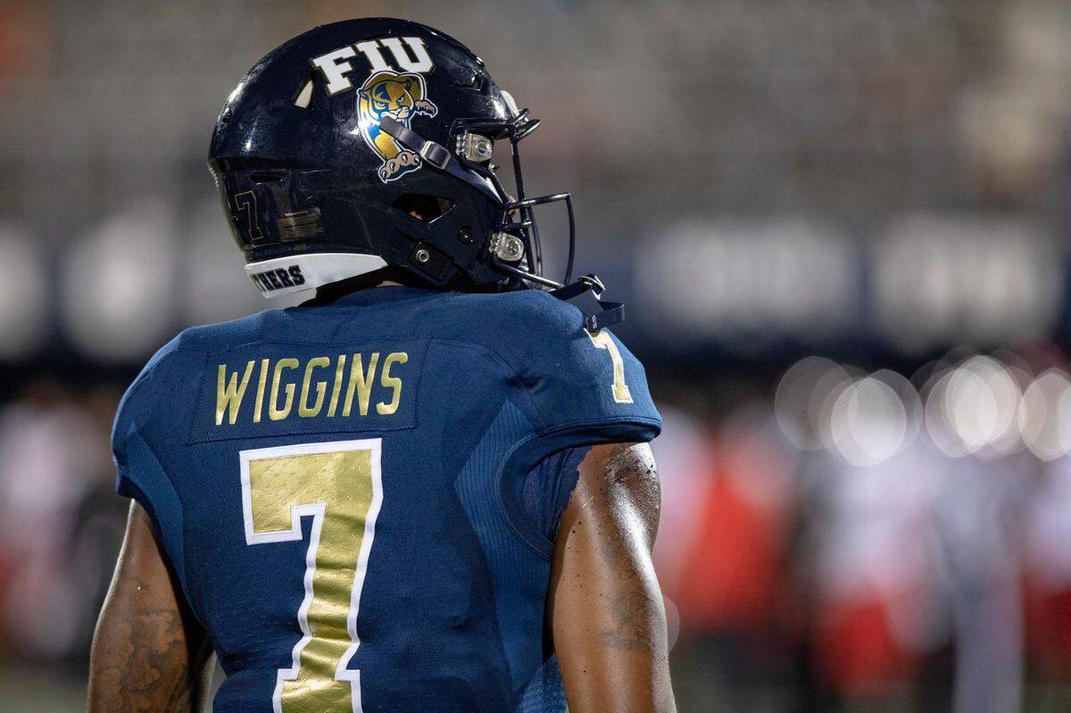 FIU quarterback Kaylan Wiggins (7) takes the field.