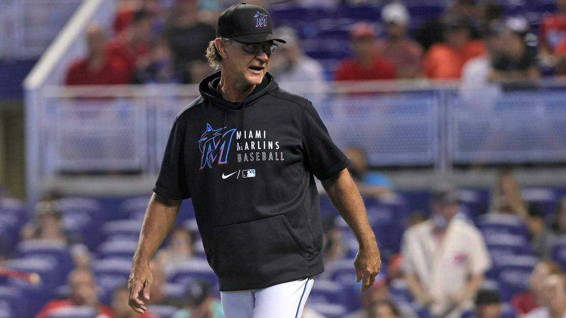 Miami Marlins manager Don Mattingly (8) looks on during the seventh inning of their baseball game against the Cincinnati Reds at loanDepot park on Sunday, August 29, 2021 in Miami, Florida.