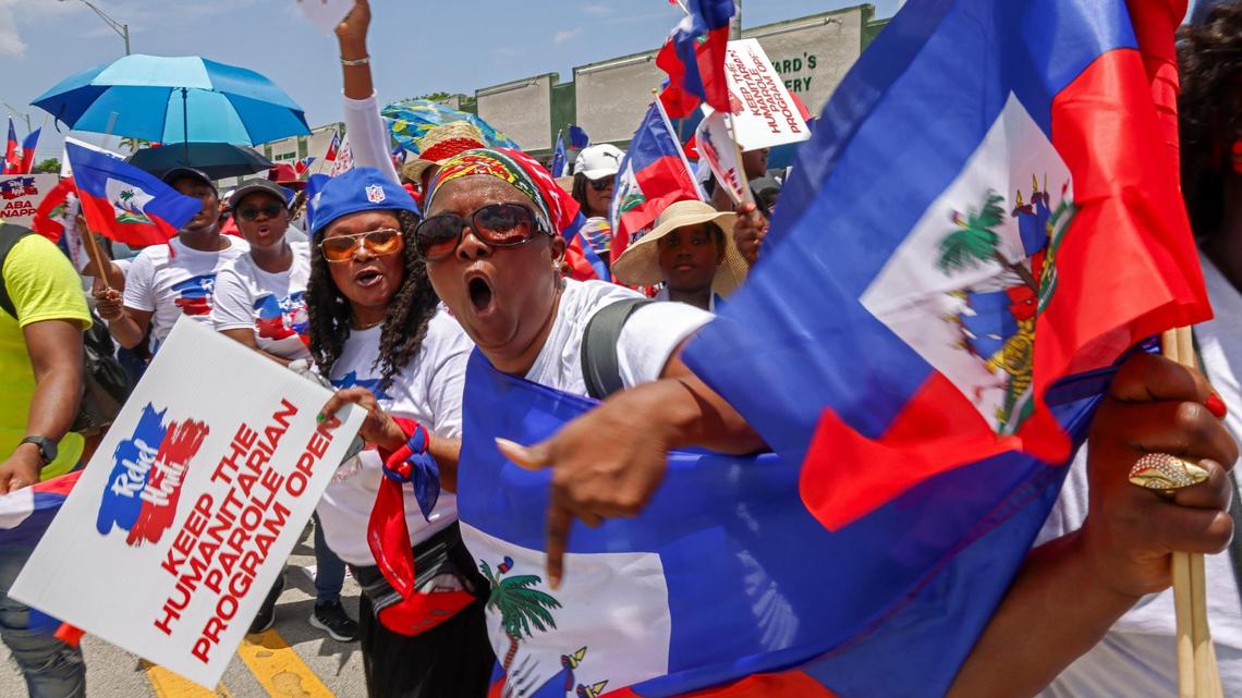 In Miami last weekend, Haitian demonstrators wave flags and chant words of support on Sunday in North Miami, joining Haitians across the United States and the world in a march to bring awareness to the escalating violence in the Caribbean country.