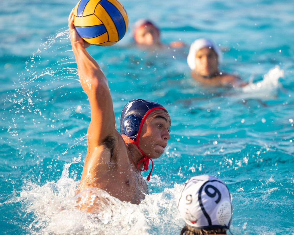 MAST’s Jonah Miguel (3) throws the ball during the fourth quarter of the GMAC boys water polo finals on Wednesday, March 20, 2024, at MAST Academy on Virginia Key.