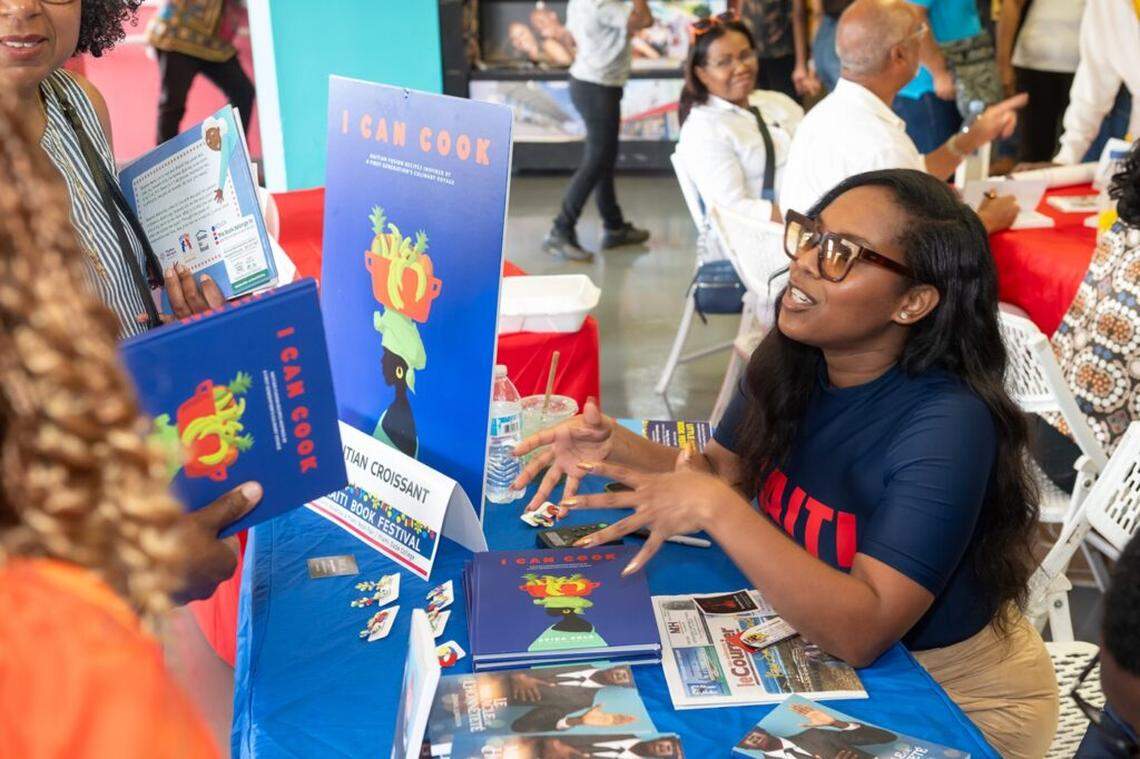 More than 30 authors will gather at the Little Haiti Cultural Center and the Caribbean Marketplace (Mache Ayisyen) to showcase and sign their books. Above,&nbsp; author Ayida Solé presents her Haitian cuisine recipe book “I Can Cook” during last year’s festival. 