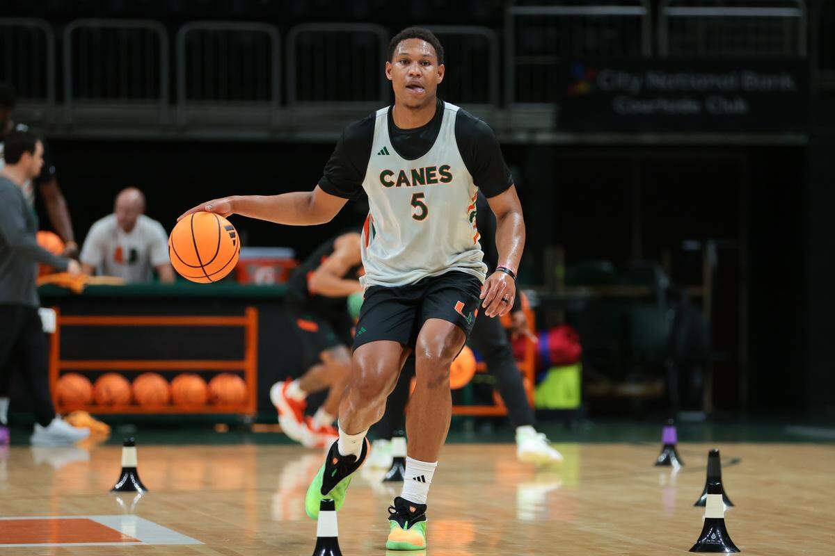 Miami Hurricanes guard Malik Reneau (5) dribbles the basketball during practice at the Watsco Center in Coral Gables, Florida, Monday, September 22, 2025.