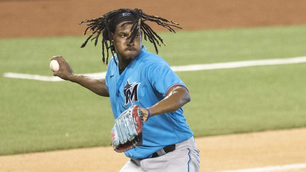 José Ureña (62) throws to first base to tag out Jesus Aguilar (24) during Miami Marlins simulated practice game at Marlins Park on Thursday, July 16, 2020.