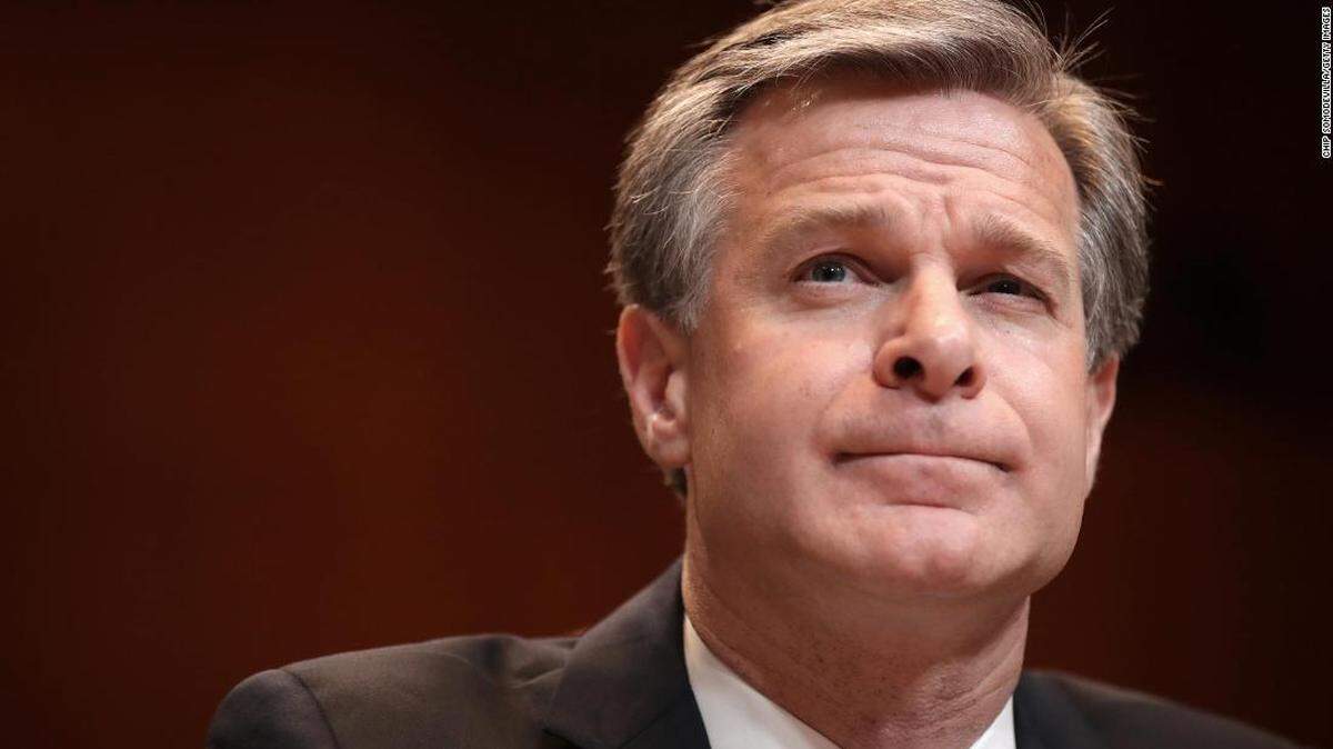 Christopher Wray, FBI director appointed by President Trump, has not let politics intrude as he does his job. President Biden will keep him in the post.