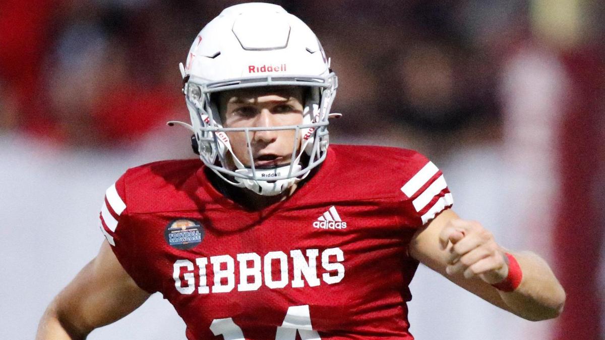 Cardinal Gibbons Chiefs quarterback Michael Merdinger (14) runs the ball against Cardinal Gibbons Crusaders (NC) during the Broward County National Football Showcase on Friday, August 25, 2023 at Cardinal Gibbons High in Fort Lauderdale. Andrew Uloza / for Miami Herald