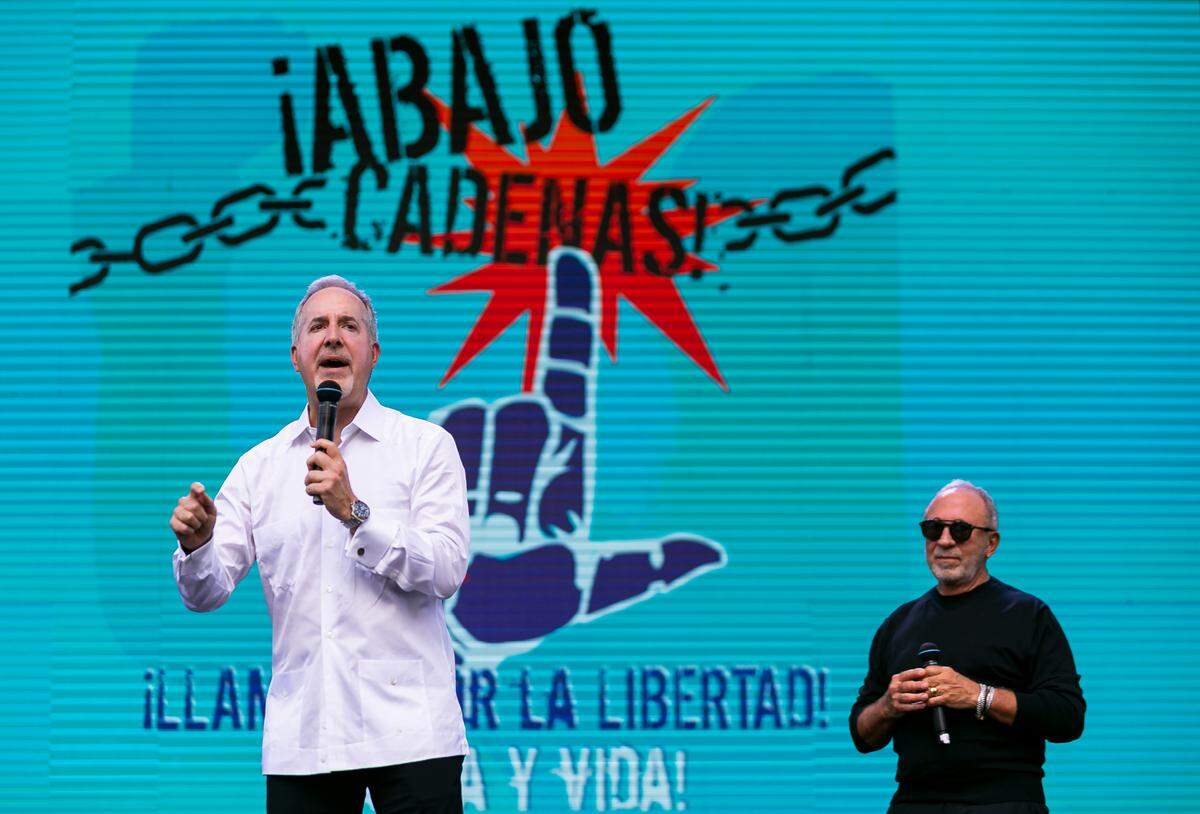 Jorge Mas, chief executive of MasTec, speaks during a rally at Bayfront Park in downtown Miami on Saturday, July 31, 2021.