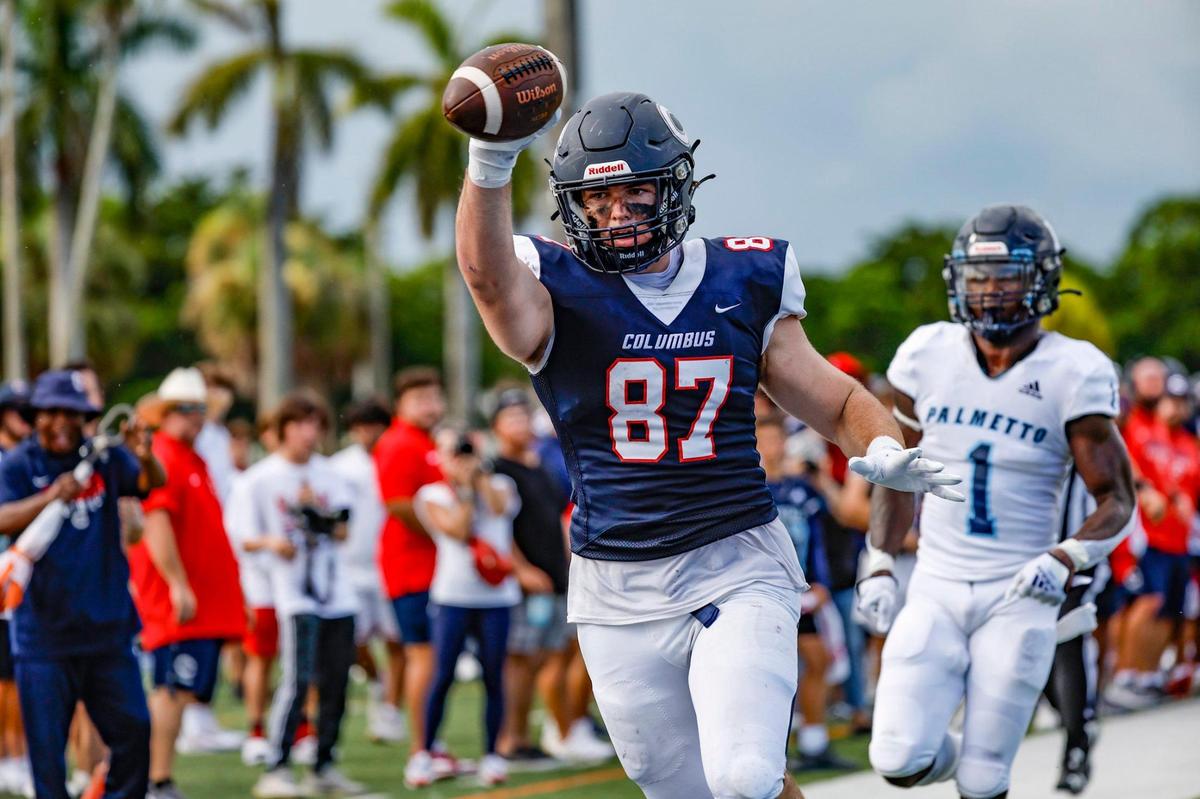 Columbus High School tight end Benjamin Blackburn (87) scores a touchdown in the first half against Palmetto High School at Tropical Park Stadium in Miami, Florida on Saturday, September 16, 2023.