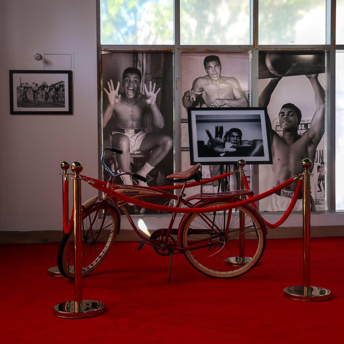 Ali’s Schwinn bicycle is displayed among photographs at the exhibit reflecting on the 60th Anniversary of the Ali and Sonny Liston’s fight through photographs, personal items.