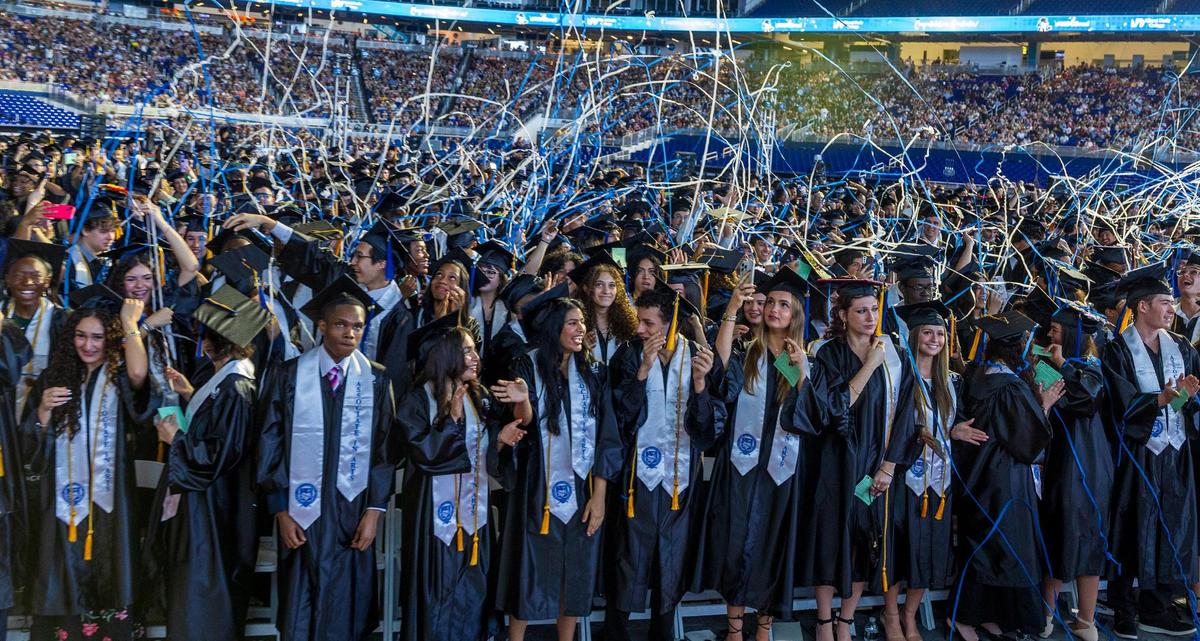 Graduating students celebrate under a rain of confetti during Miami Dade College’s North, Hialeah and West Campuses 2025 commencement ceremonies at LoanDepot Park, in Miami on Saturday, April 26, 2025.