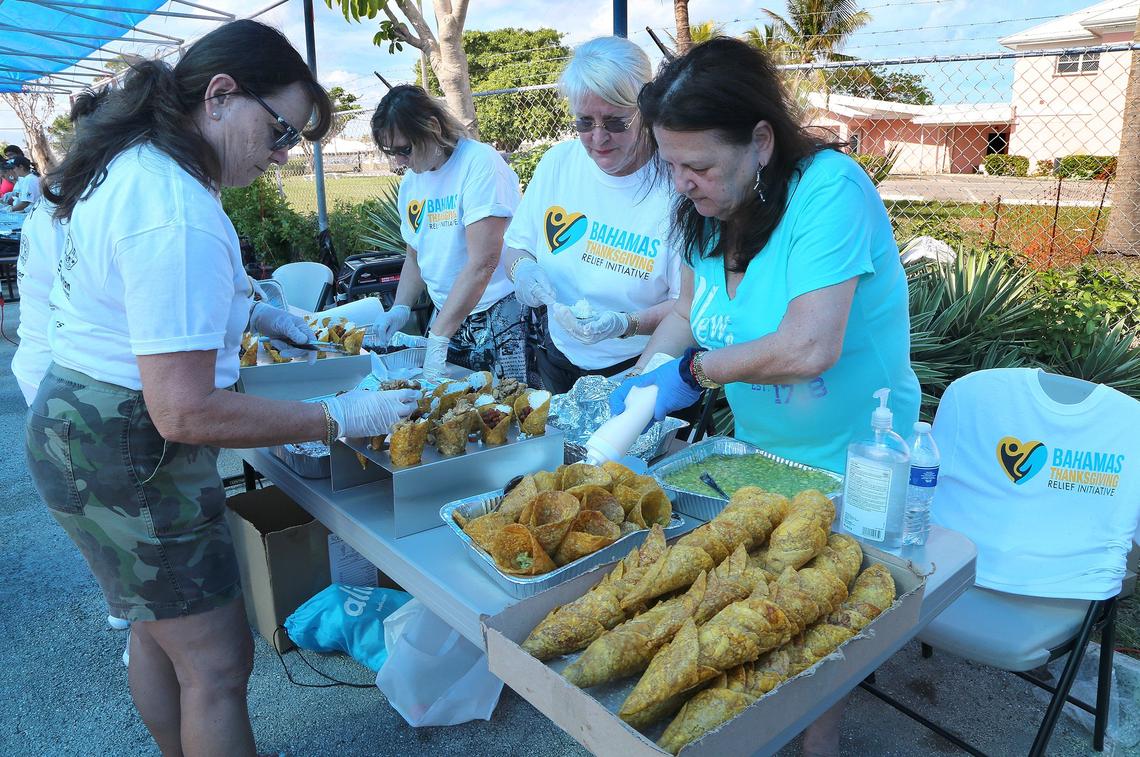 Volunteers prepare plantain conos filled with different ingredients following Chef David Aaron’s recipe (of Conos restaurant in Miami Beach), for the Bahamas Thanksgiving Relief Lunch, organized by the Third Wave Volunteers Organization, at a church in Freeport, Bahamas, on Nov. 23, 2019.