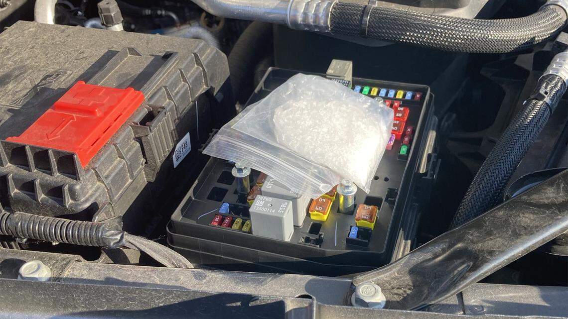 Agents found about 28 grams of meth hidden in a fuse box with a passenger who was accused two weeks ago of hiding the drug in bread, Louisiana cops say.