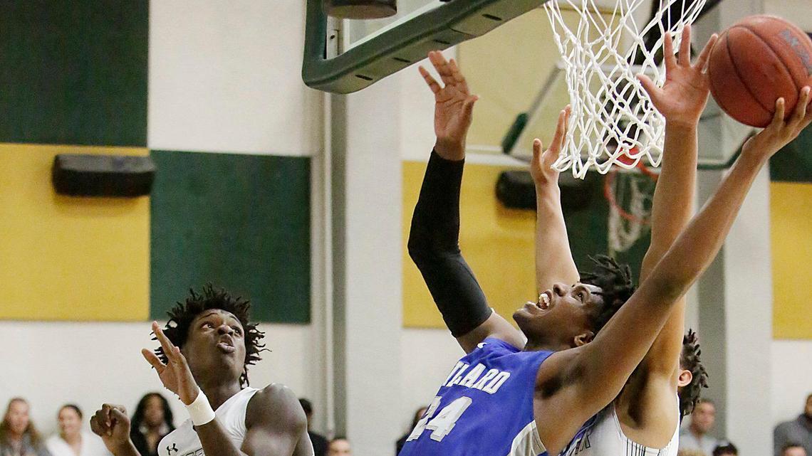 Dillard’s Jalen Haynes (24) tries to score against Mater Academy during the regional 4-6A championship basketball game on Friday, February 28, 2020 at Mater Academy in Hialeah Gardens