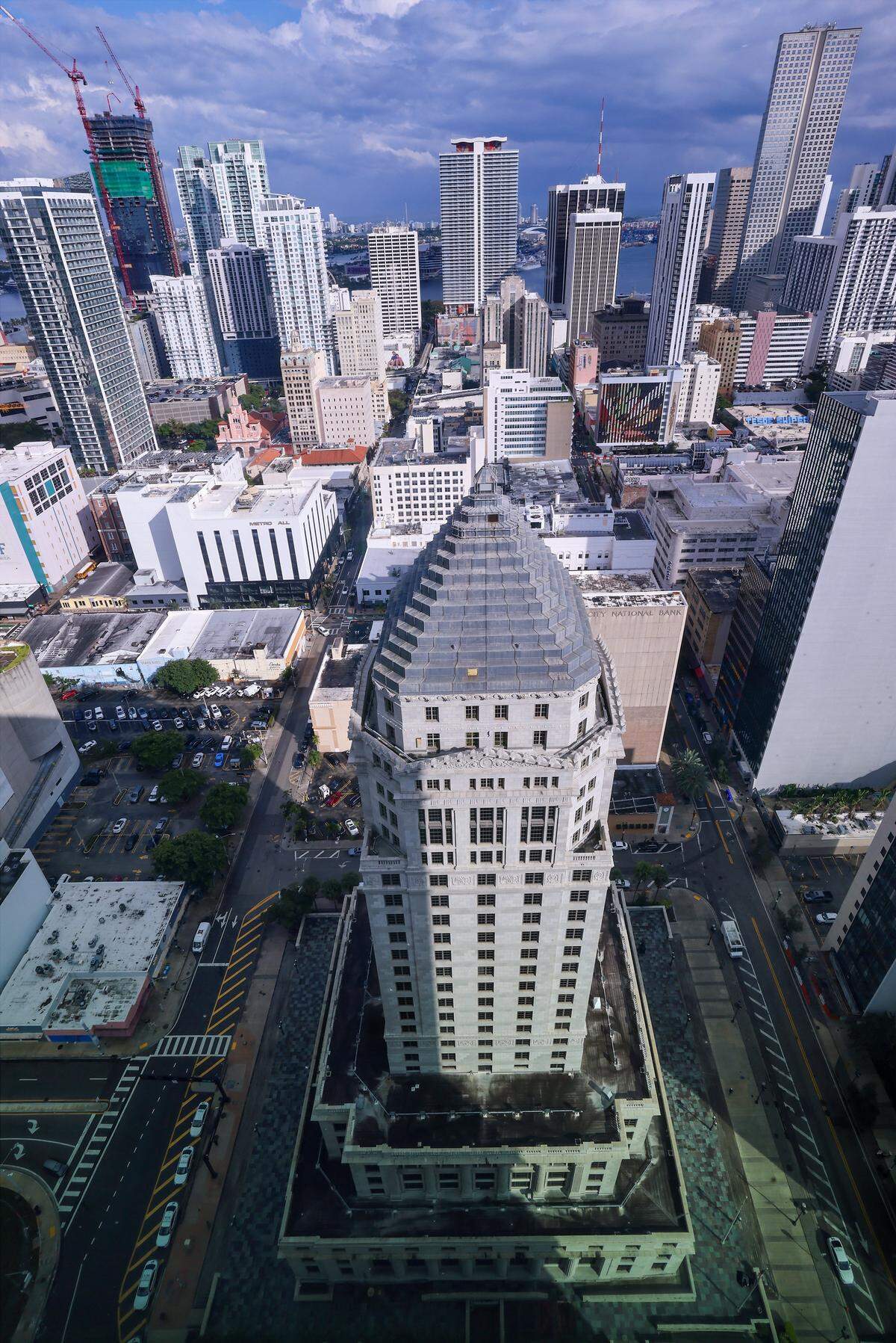 The historic Dade County Courthouse is viewed from the new Osvaldo N. Soto Miami-Dade Justice Center, which replaced it on Wednesday, January 14, 2026, in Miami, Florida. The historic Dade County Courthouse in downtown Miami has undergone extensive renovations aimed at preserving its architectural legacy while modernizing key facilities. Restoration efforts focused on protecting original features such as but not limited to the marble-clad lobby, ornate courtrooms, and the iconic clock tower, which have been cleaned and repaired to reflect their 1920s grandeur.