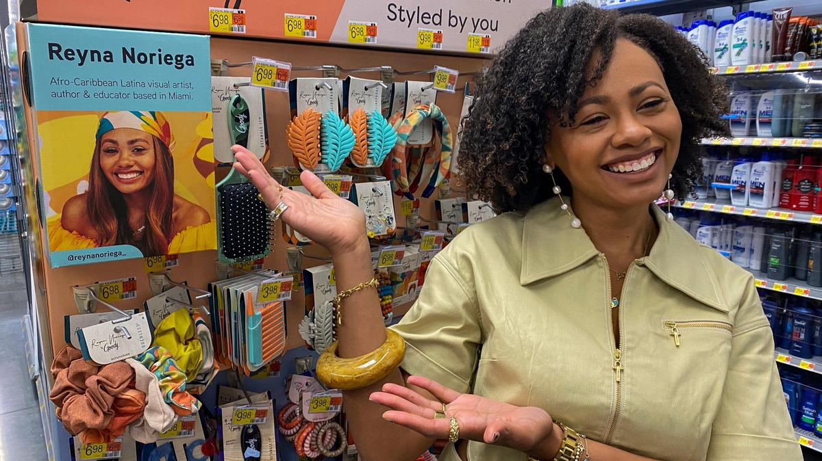 Reyna Noriega shows off her hair accessory product line on March 10, 2023, at the Walmart Supercenter on South Dixie Highway in Miami.