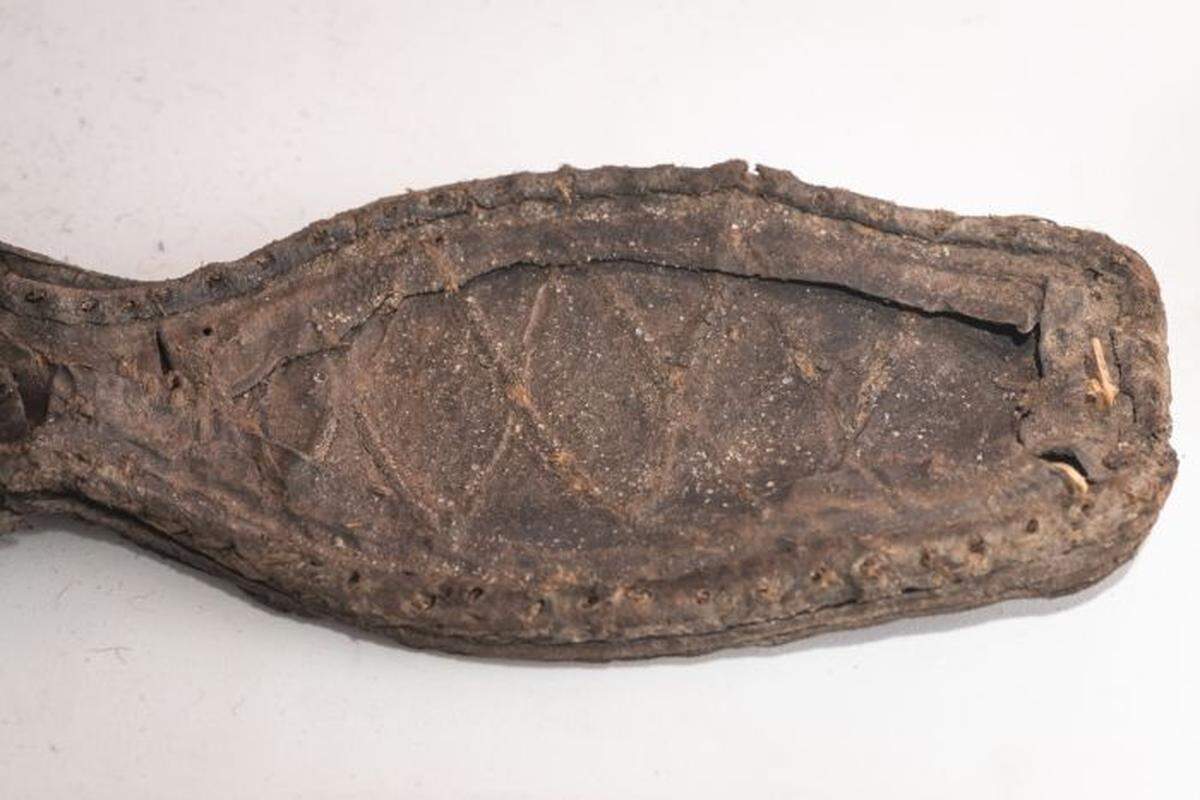 Shoes, and pieces of heel, showed designs from the east and west, and represent the era when men first started to wear heeled shoes, researchers said.