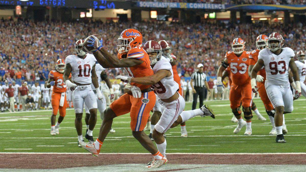 In this file photo, Florida wide receiver Antonio Callaway (81) catches a touchdown pass against Alabama in the first half during the Southeastern Conference championship at the Georgia Dome in Atlanta on Saturday, Dec. 3, 2016.
