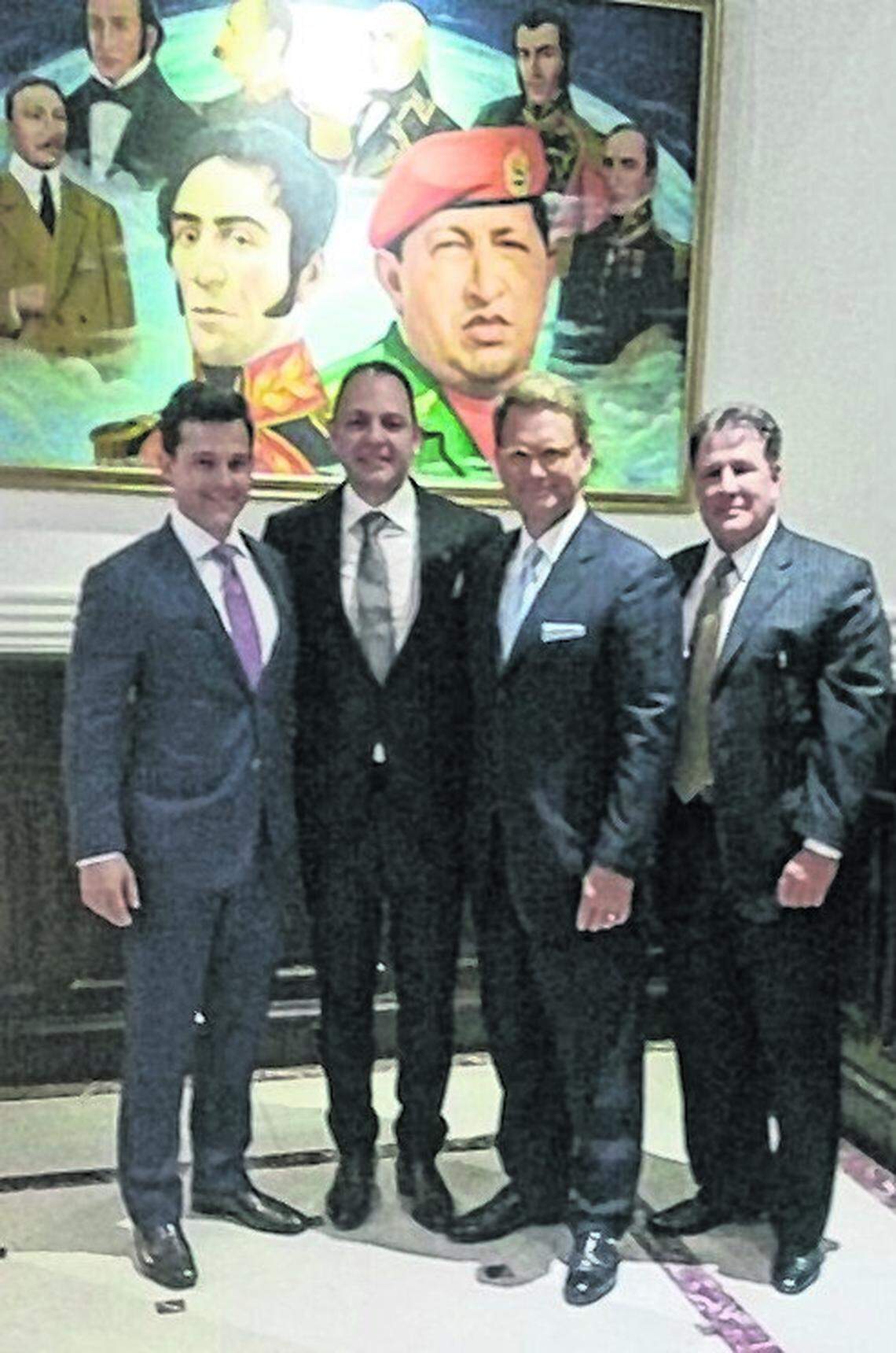Miami businessman Hugo Perera, far right, poses with Todd Swanson, CEO of Horizontal Well Drillers, far left, Raúl&nbsp;Gorrín, a Venezuelan TV mogul, center left, and Jeremy Klein, president of Horizontal Well Drillers, center right, at the Miraflores presidential palace in Caracas after signing an oil deal with Venezuelan President Nicolás&nbsp;Maduro in July 2017.