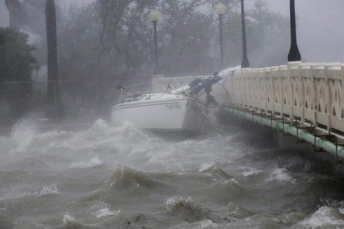 A sailboat crashes into a bridge on the Venetian Causeway due to Hurricane Irma on Sunday, Sept. 10, 2017.